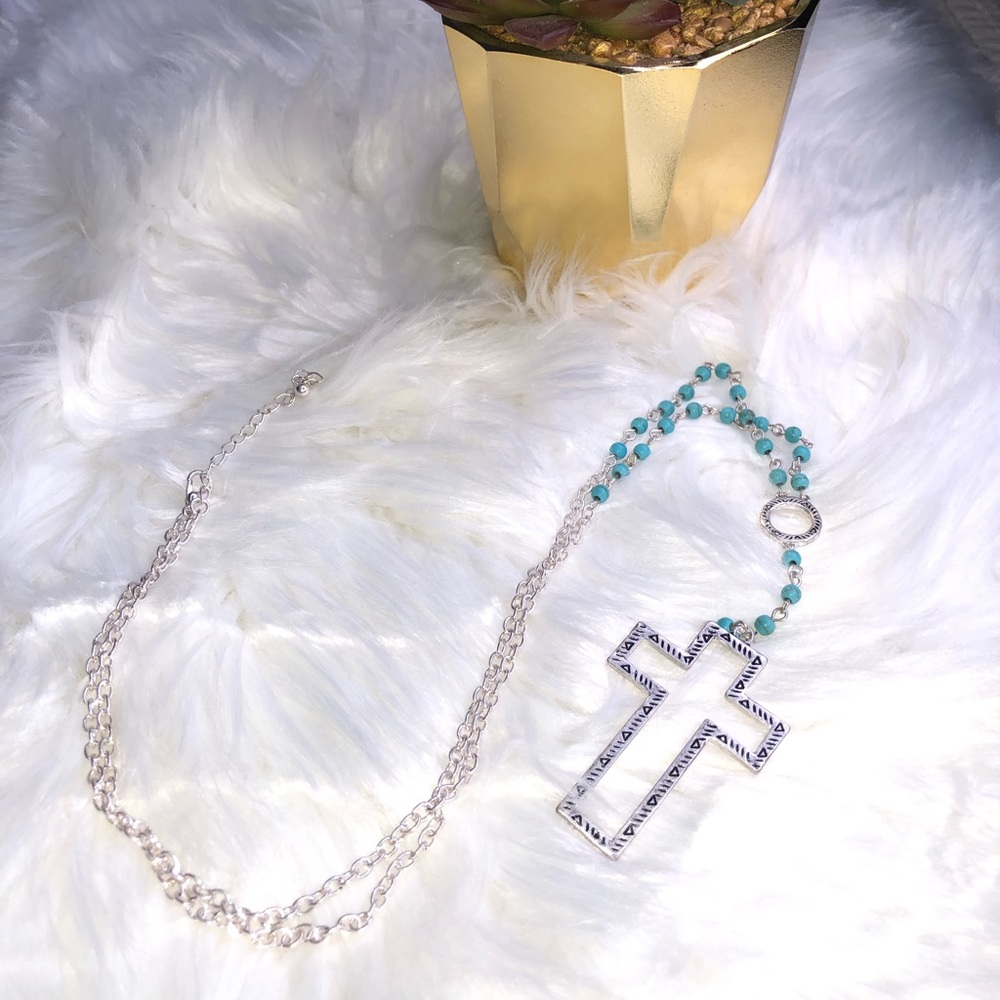 Silver tone cross with turquoise colored beads